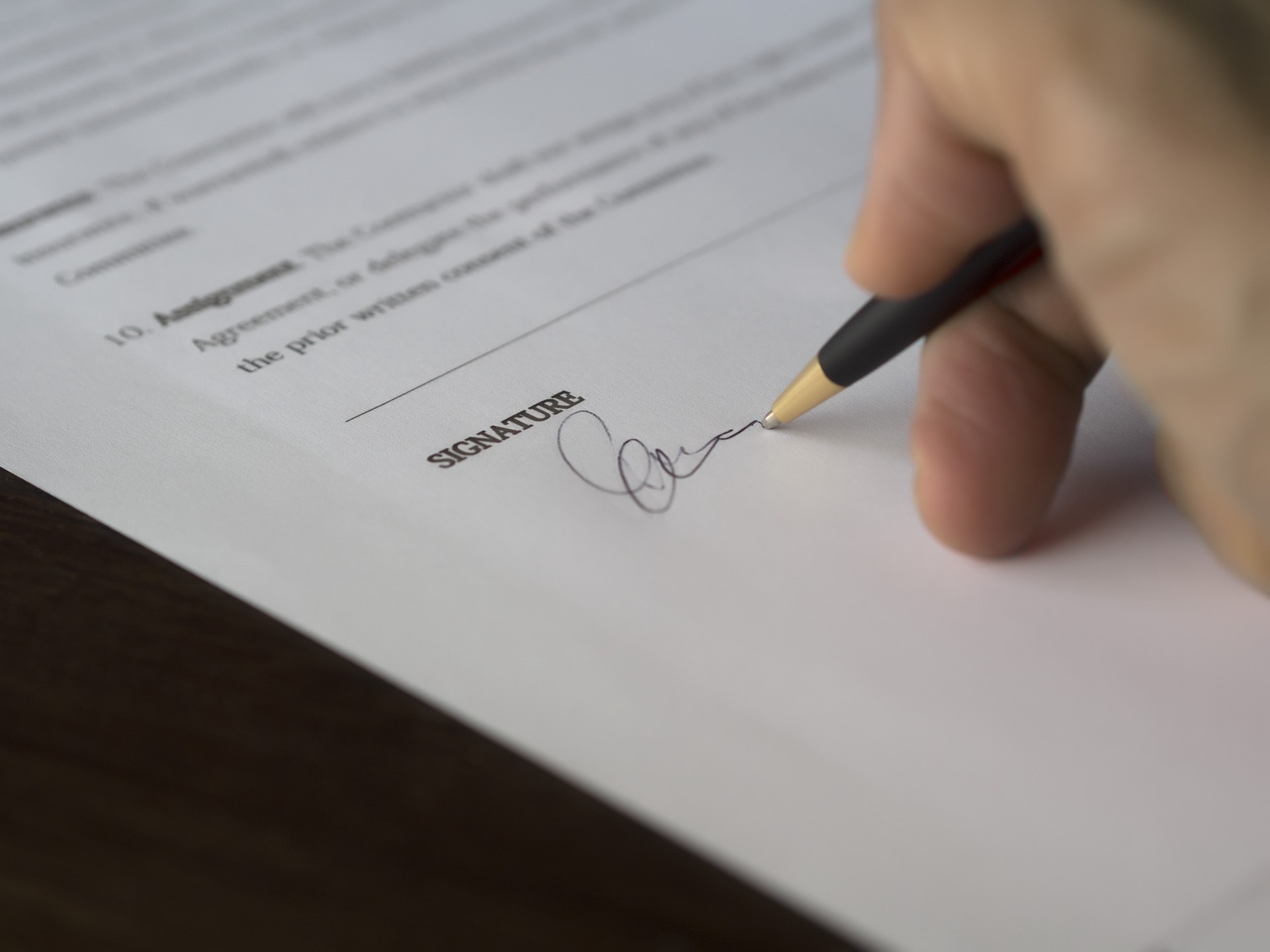 Signing car insurance agreement for added broker coverage